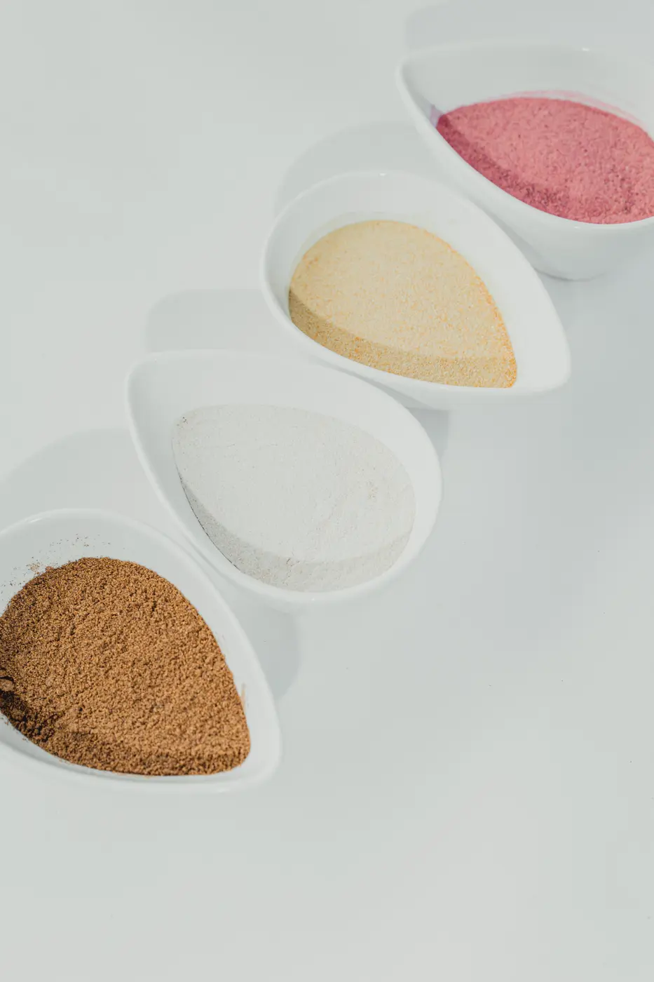 Sol Organica green banana flour shown alongside other tropical powders